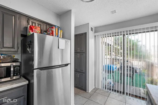 a kitchen with a sink and a window