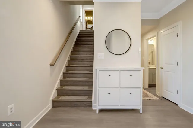 a bedroom with a large bed and a large window