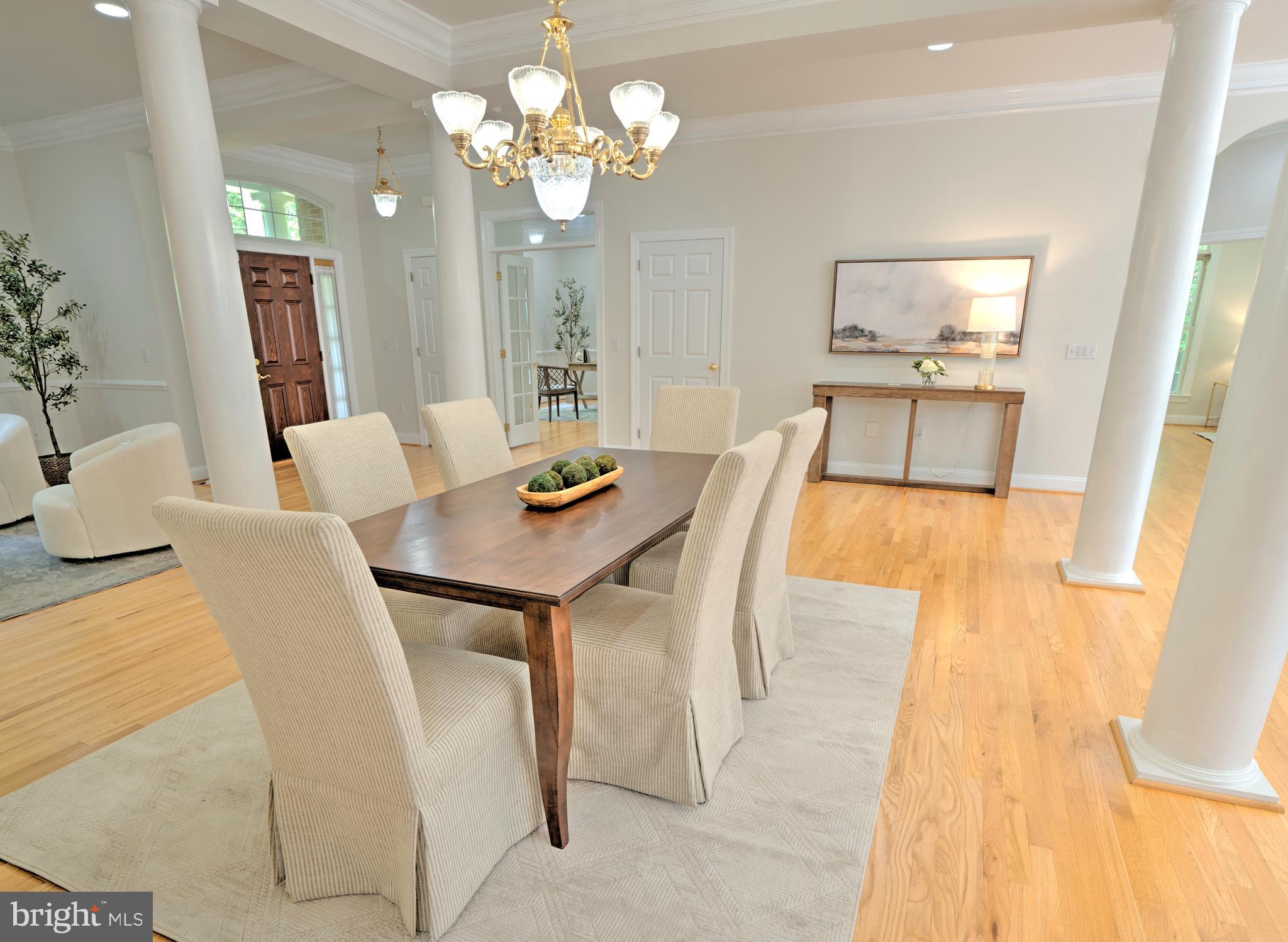 4300 Pinetree Road Rockville, MD 20853 - Photo 15 of 50 a view of a dining room with furniture and wooden floor