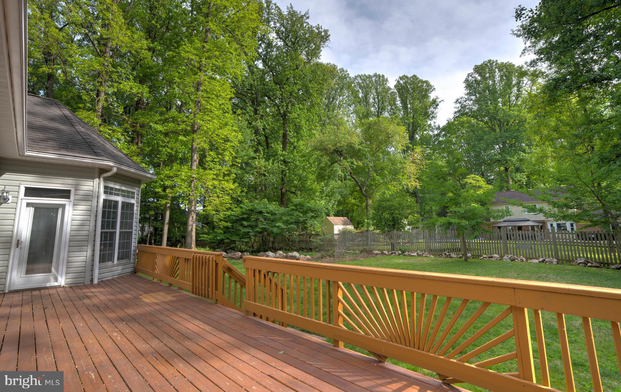 4300 Pinetree Road Rockville, MD 20853 - Photo 40 of 50 an outdoor view of garden with deck