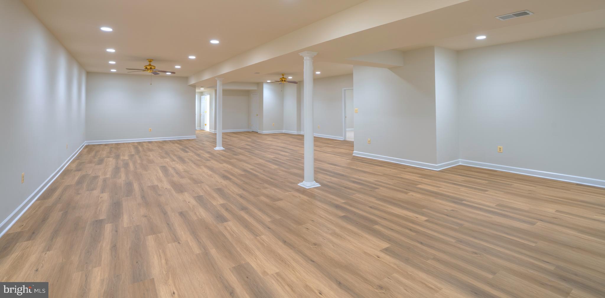 4300 Pinetree Road Rockville, MD 20853 - Photo 41 of 50 a view of empty room with wooden floor