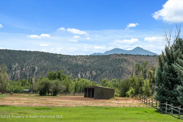 a view of outdoor space with mountain view