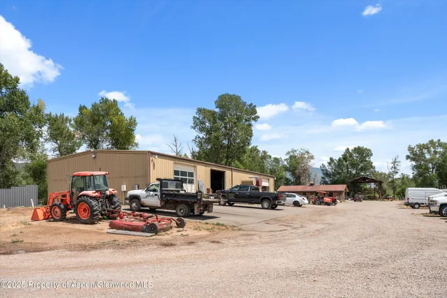 a view of a car parked in front of a house