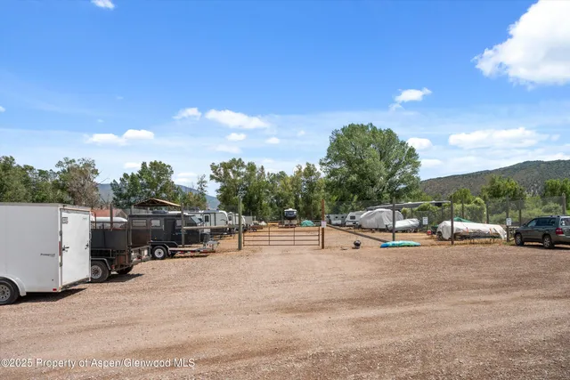 a view of a terrace with yard