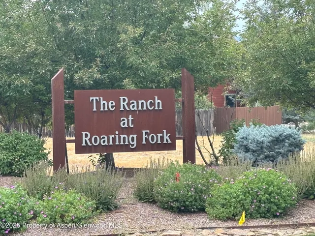 a sign on the side of a road