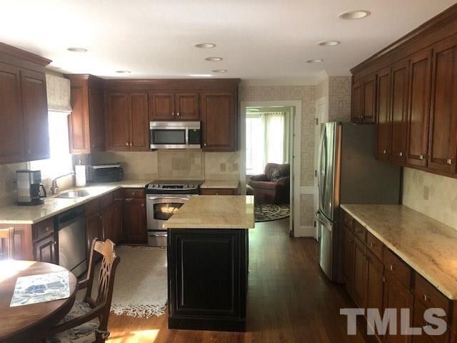7304 Tanbark Way Raleigh, NC 27615 - Photo 3 of 24