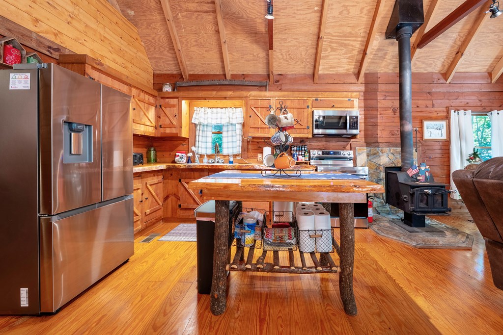 84 Knights Way Blairsville, GA 30512 - Photo 11 of 51 a view of a dining room with furniture window and wooden floor