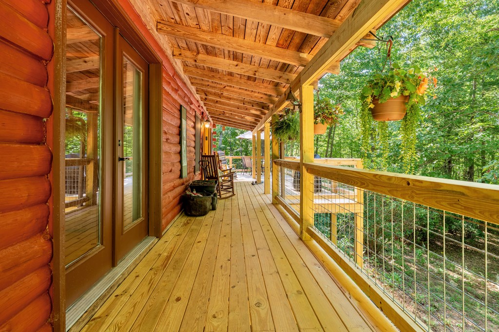 84 Knights Way Blairsville, GA 30512 - Photo 33 of 51 a view of balcony with wooden floor