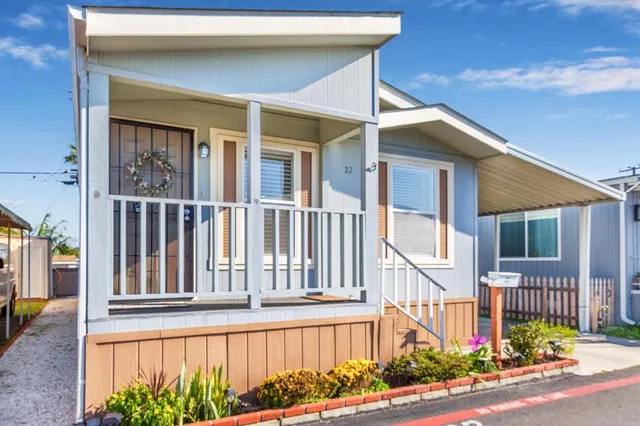 a view of a house with swimming pool