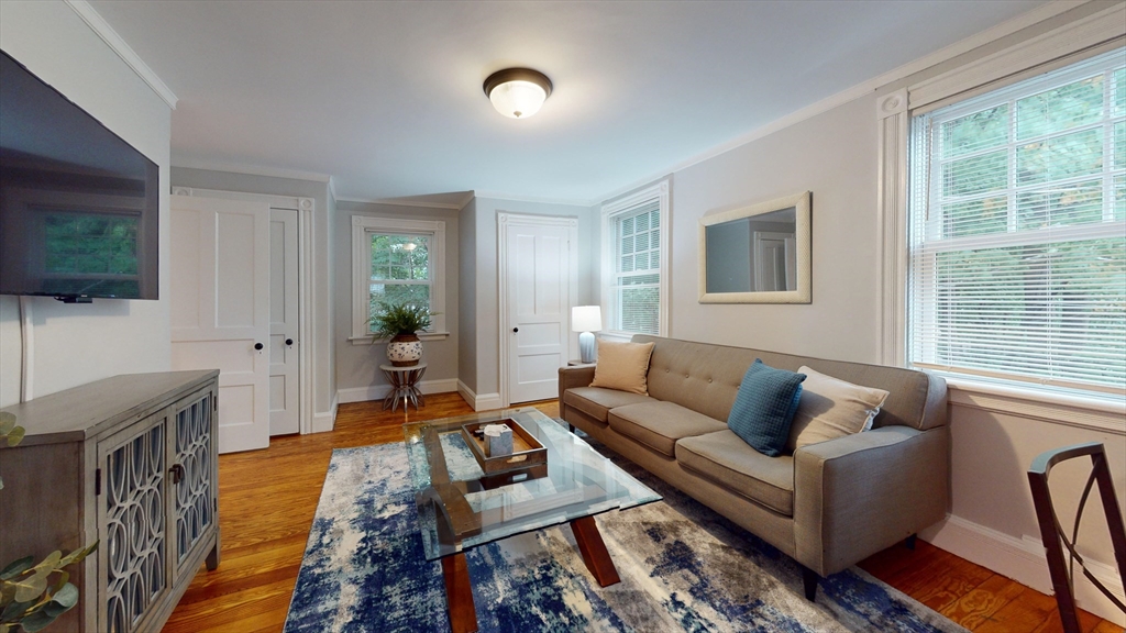 16 Linder Terrace, Unit 2 Newton, MA 02458 - Photo 5 of 22 a living room with furniture and a flat screen tv