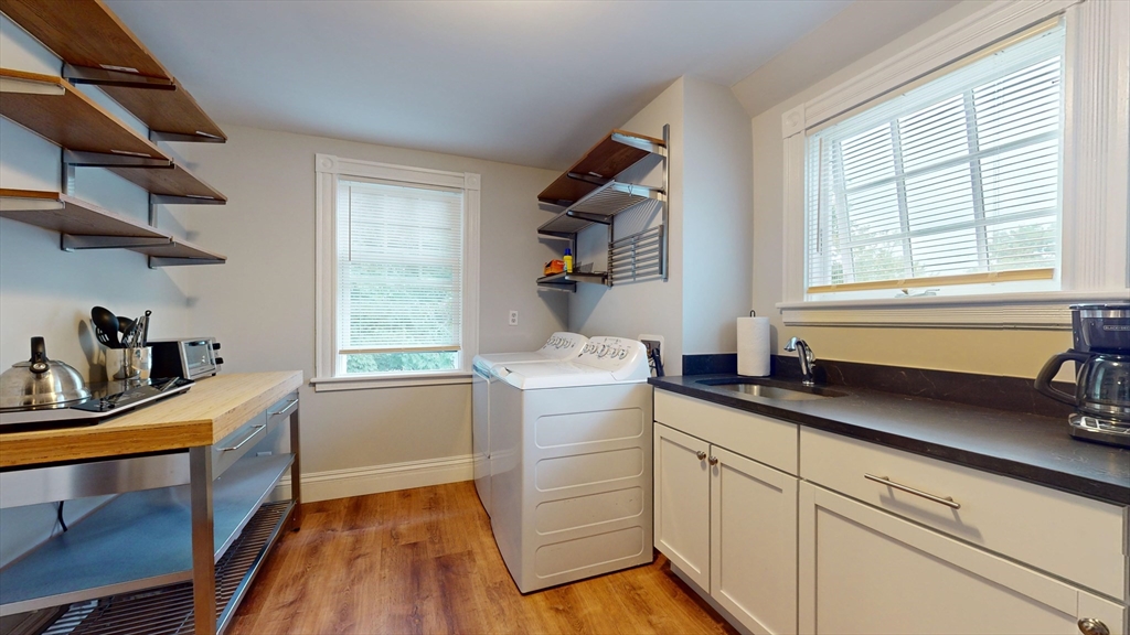 16 Linder Terrace, Unit 2 Newton, MA 02458 - Photo 7 of 22 a kitchen with sink cabinets and appliances
