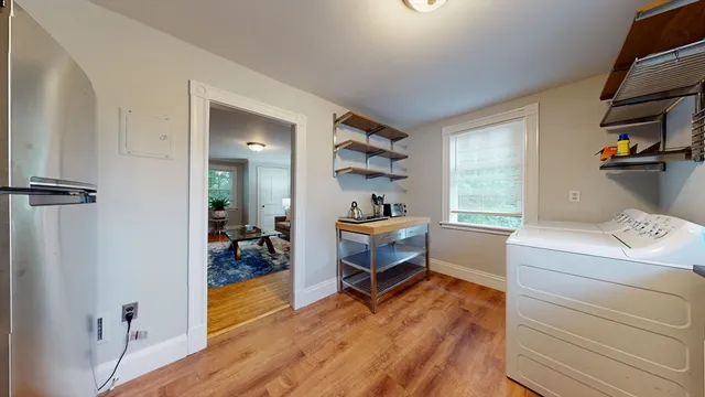 a room with a bed and a window