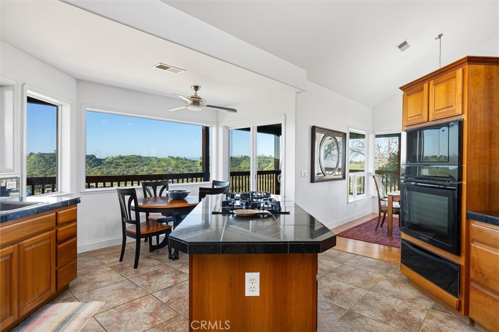 1985 Penman Springs Road Paso Robles, CA 93446 - Photo 14 of 65 a view of a dining room with furniture window and outside view