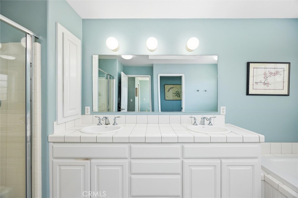 1985 Penman Springs Road Paso Robles, CA 93446 - Photo 22 of 65 a bathroom with a sink and a mirror