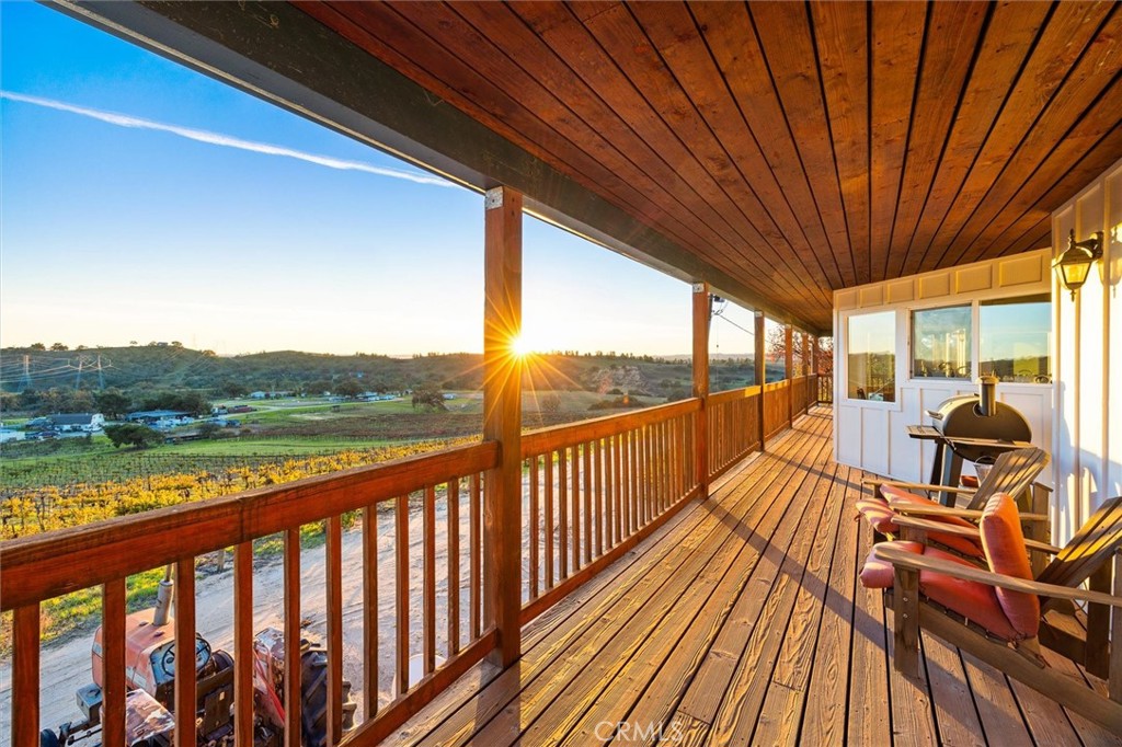 1985 Penman Springs Road Paso Robles, CA 93446 - Photo 25 of 65 a view of balcony with furniture and wooden floor