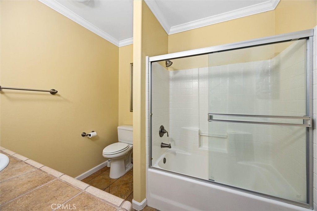 1985 Penman Springs Road Paso Robles, CA 93446 - Photo 29 of 65 a bathroom with a shower and a toilet