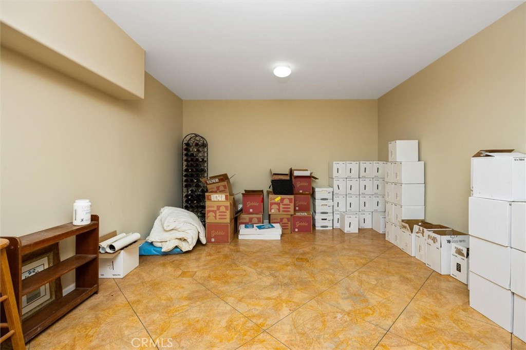 1985 Penman Springs Road Paso Robles, CA 93446 - Photo 36 of 65 a bed room with a bed and a chair