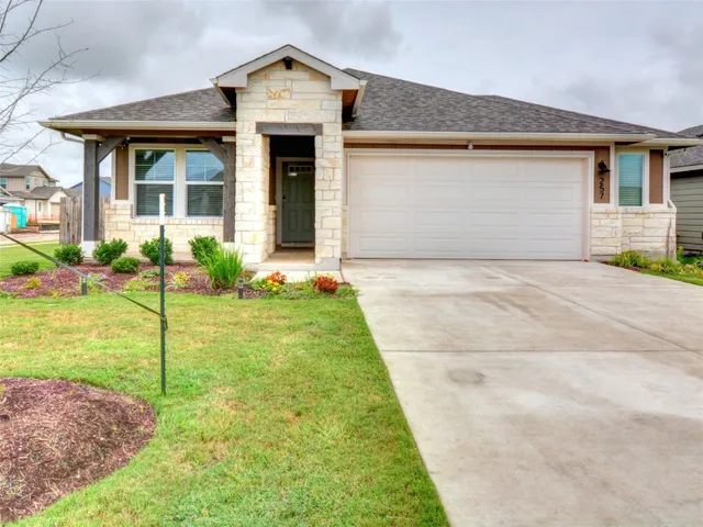 a front view of house with yard