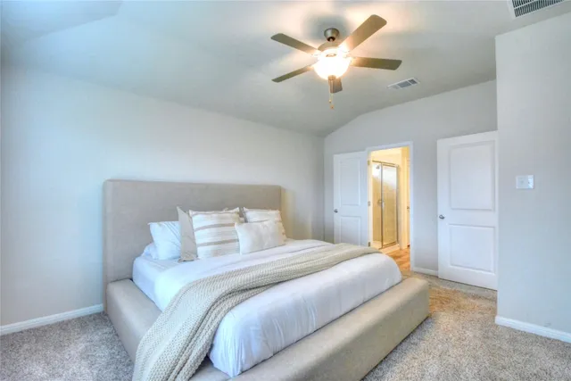 a en suite bathroom with a sink and a mirror