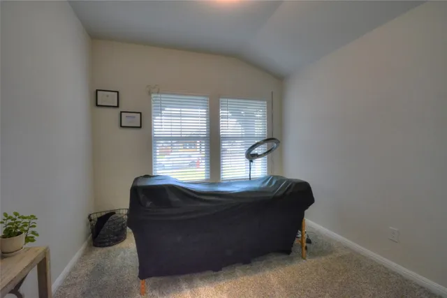 a living room with hard wood floor