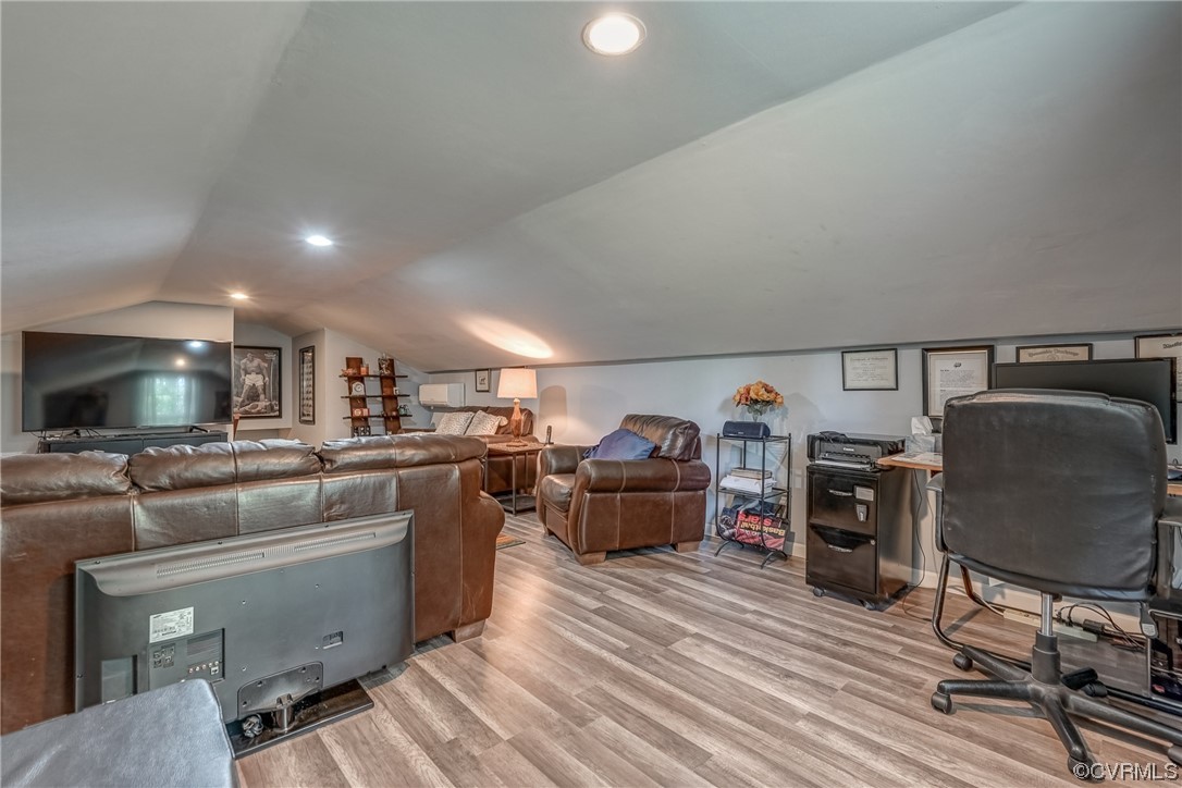 3453 Blackstone Road Kenbridge, VA 23944 - Photo 29 of 49 a living room with furniture and a flat screen tv