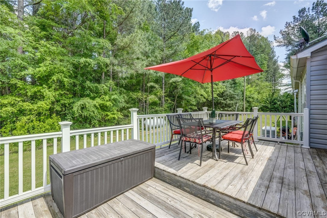 3453 Blackstone Road Kenbridge, VA 23944 - Photo 31 of 49 a view of a wooden deck with furniture