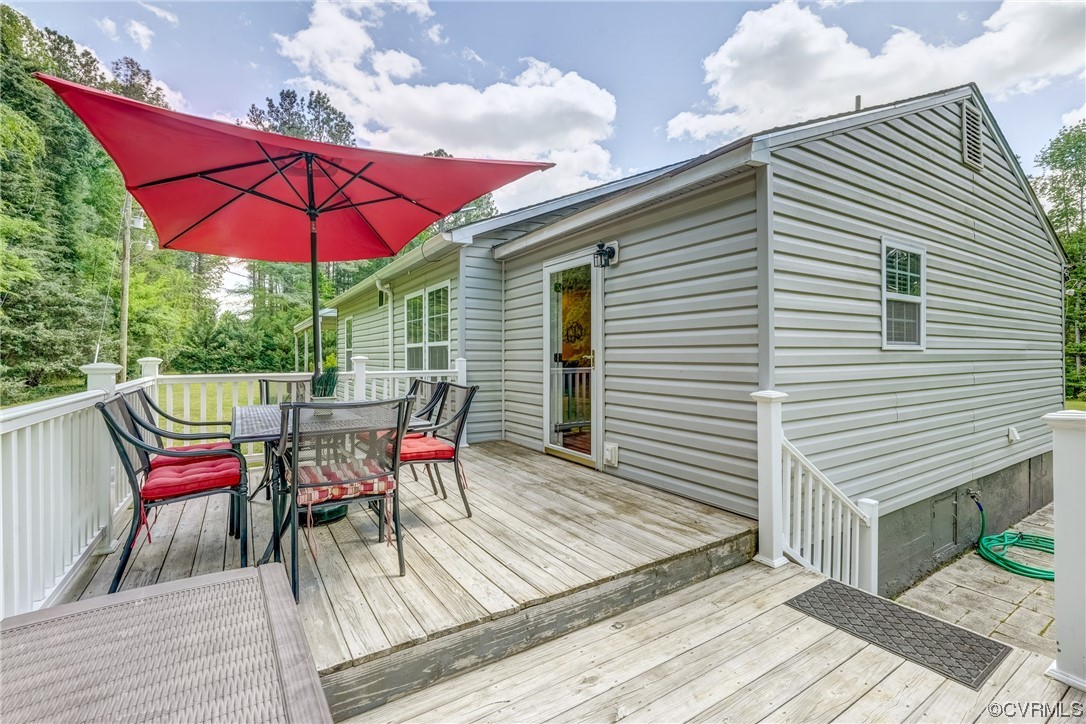 3453 Blackstone Road Kenbridge, VA 23944 - Photo 32 of 49 an outdoor space with furniture and umbrella