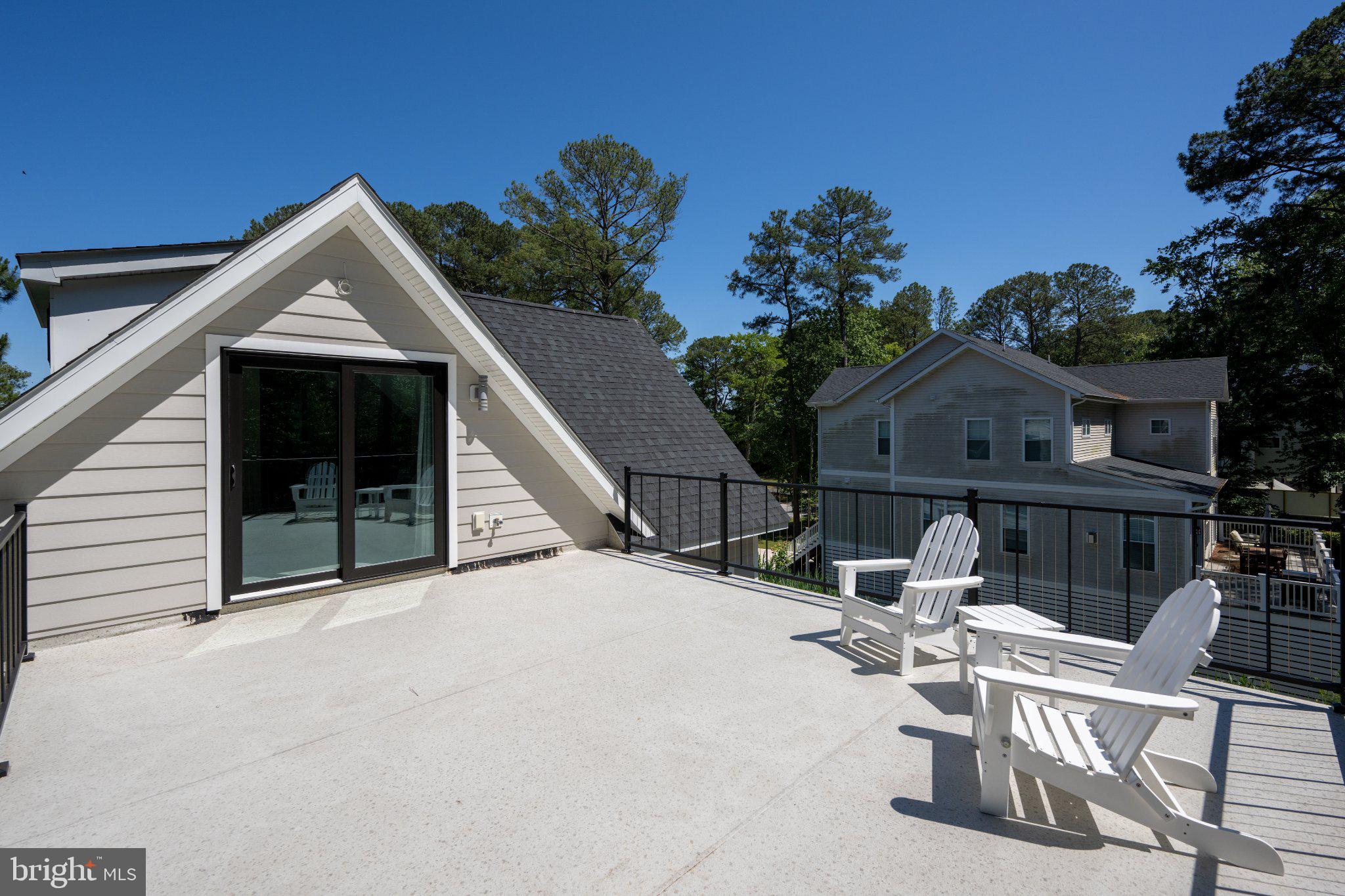 402 Salt Pond Road Bethany Beach, DE 19930 - Photo 39 of 55 Sunny rooftop retreat with serene views.