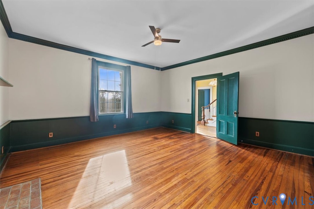 2297 Indian Oak Road Crewe, VA 23930 - Photo 17 of 46 wooden floor in an empty room with a window