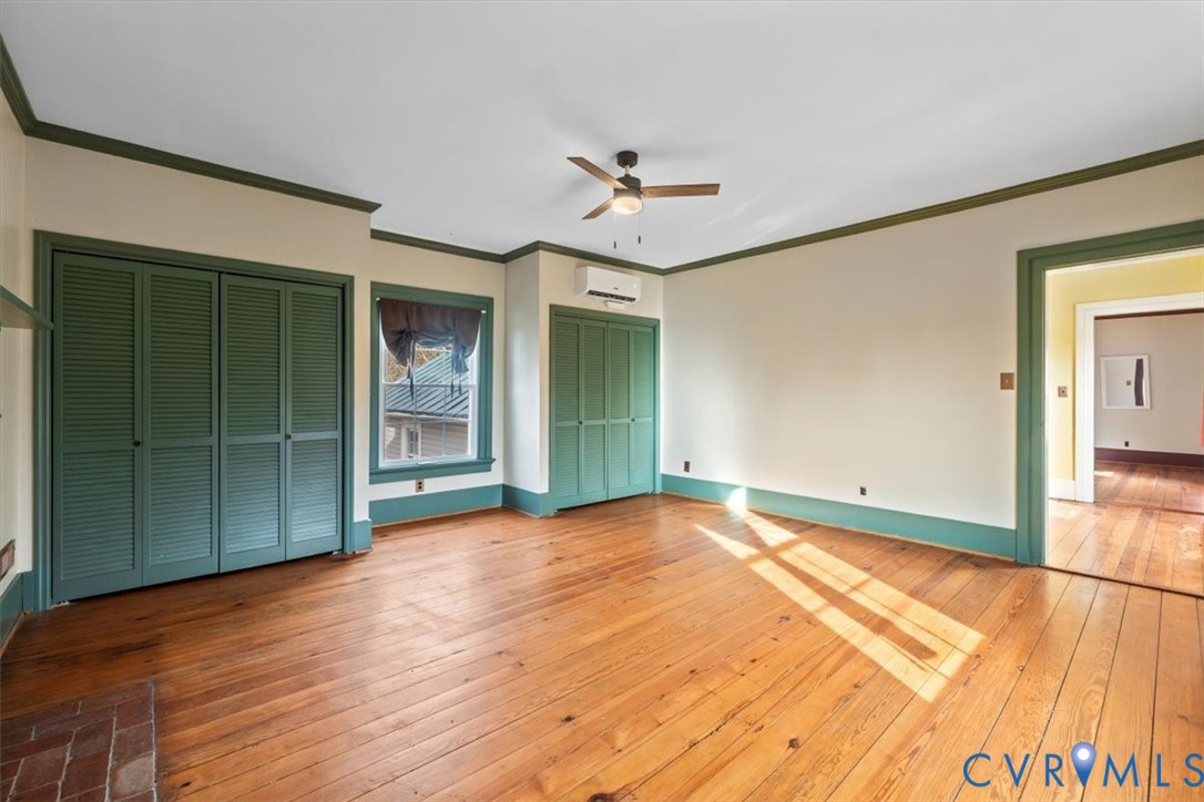 2297 Indian Oak Road Crewe, VA 23930 - Photo 27 of 46 wooden floor in an empty room with a window