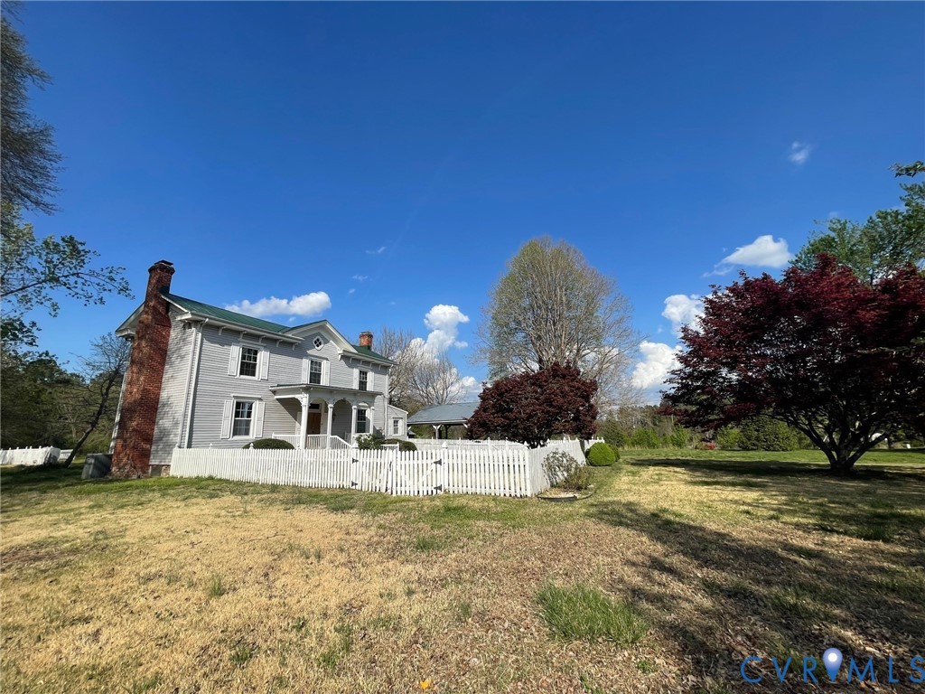 2297 Indian Oak Road Crewe, VA 23930 - Photo 3 of 46 a front view of a house with a yard