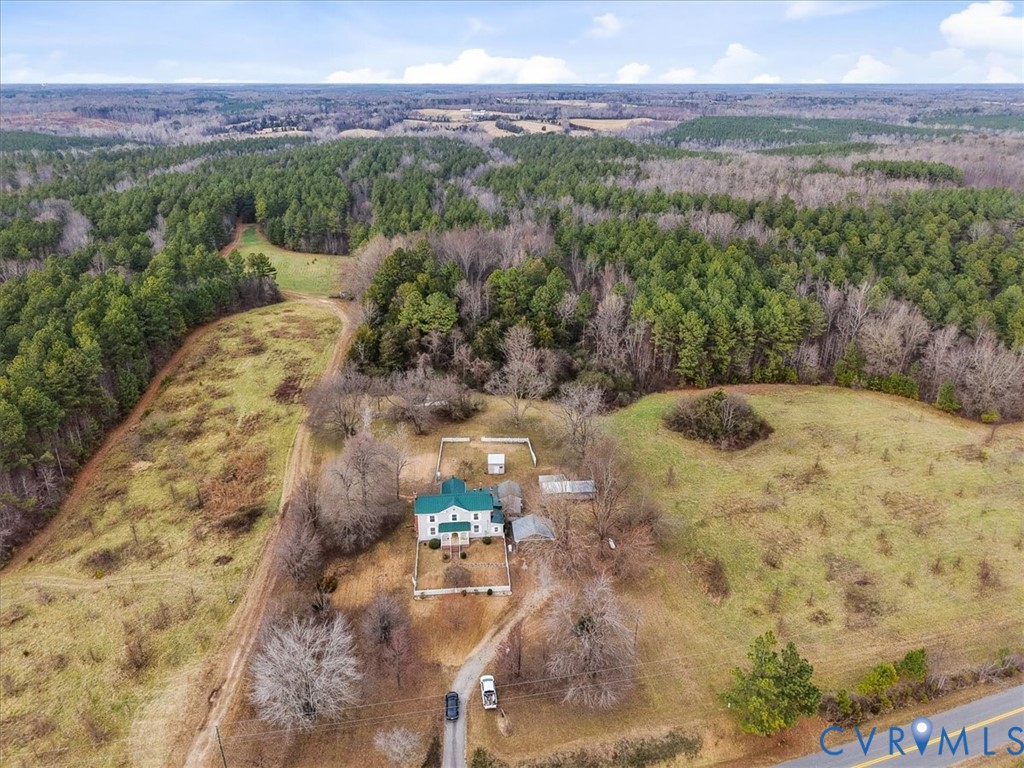 2297 Indian Oak Road Crewe, VA 23930 - Photo 41 of 46 a view of a yard with a forest