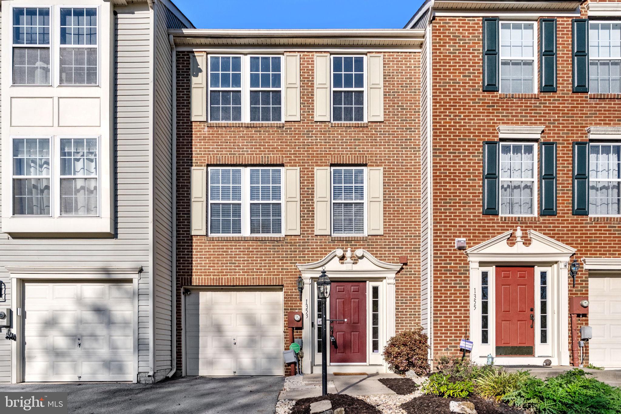 a front view of a building with a entrance