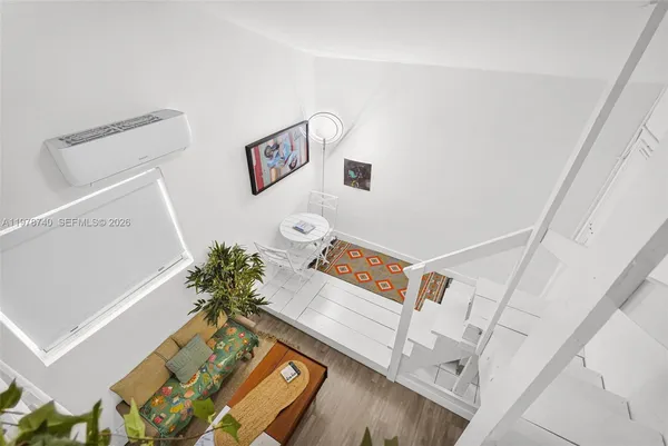 a kitchen with cabinets stainless steel appliances and a sink