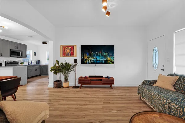 a view of a chair and table on the garden