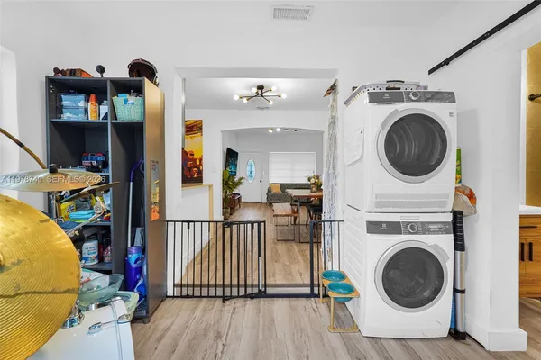 a view of a patio with couches chairs and a table