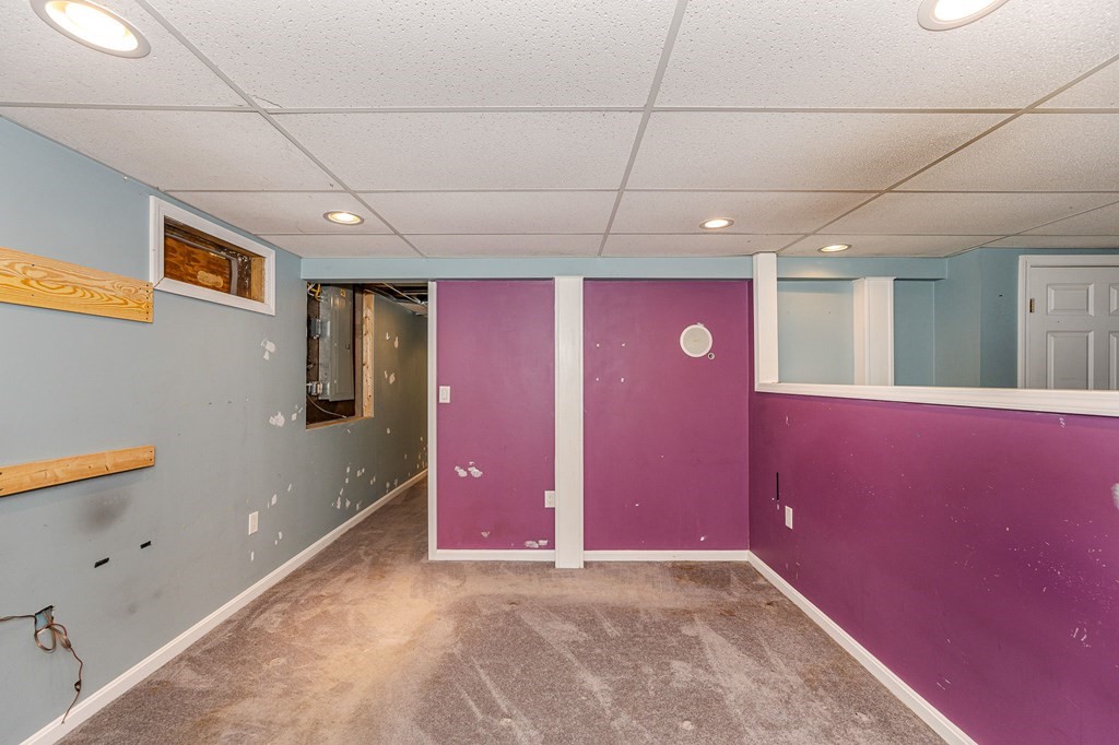 29 Emery Road Townsend, MA 01469 - Photo 19 of 25 a view of a livingroom with a red ceiling fan