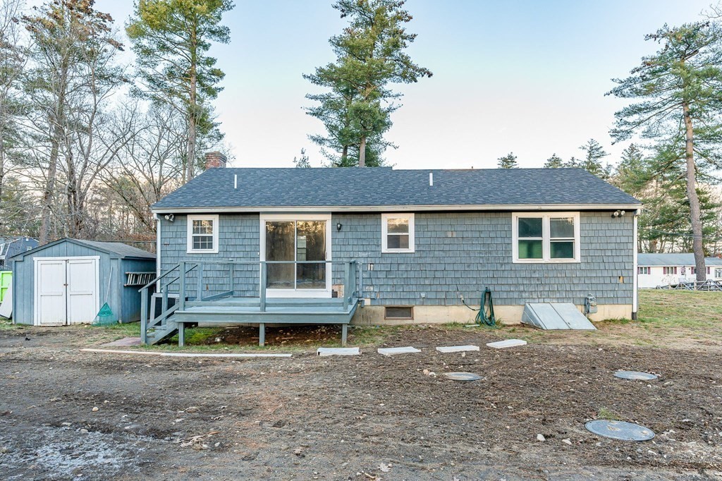 29 Emery Road Townsend, MA 01469 - Photo 24 of 25 a view of a house with a yard and large tree