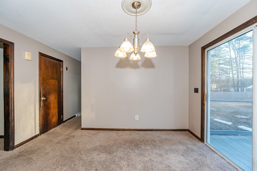 29 Emery Road Townsend, MA 01469 - Photo 5 of 25 a view of an empty room with a window