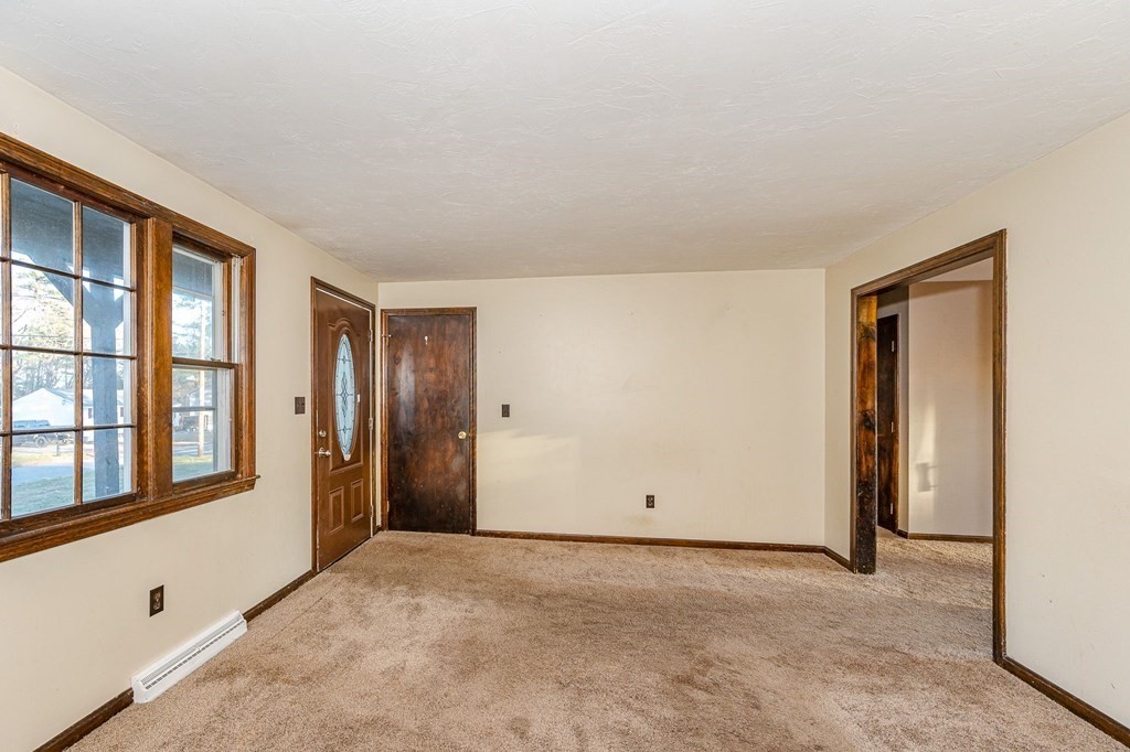 29 Emery Road Townsend, MA 01469 - Photo 7 of 25 an empty room with windows