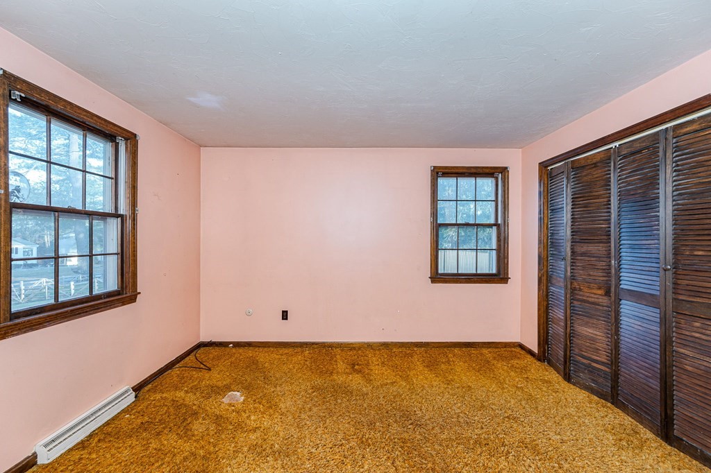 29 Emery Road Townsend, MA 01469 - Photo 8 of 25 a view of an empty room with a window