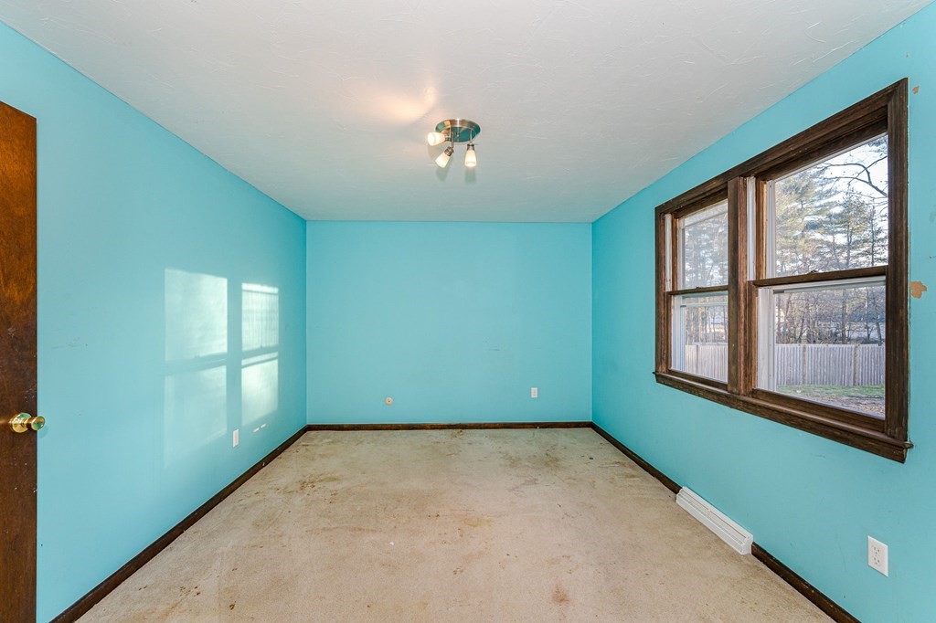 29 Emery Road Townsend, MA 01469 - Photo 10 of 25 an empty room with a window
