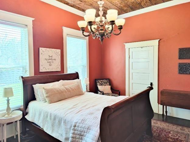 617 South 12th Street Waco, TX 76706 - Photo 15 of 27 a bedroom with a bed dresser and a window