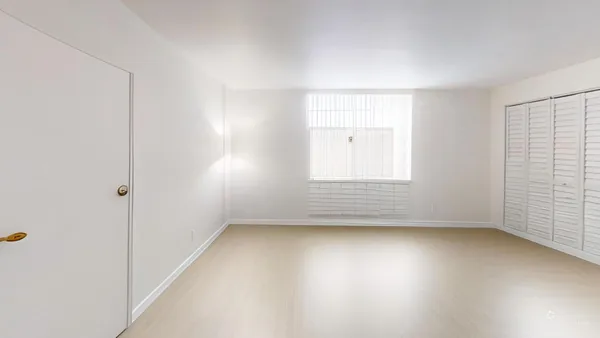 an empty room with a window