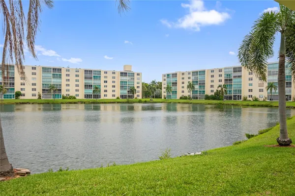 a view of a lake with building in front of it