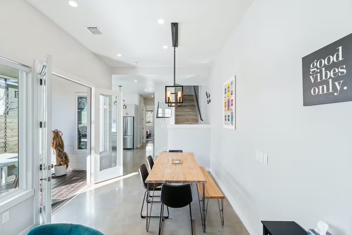 4314 Jinx Avenue, Unit A Austin, TX 78745 - Photo 13 of 40 a view of a workspace with furniture and wooden floor