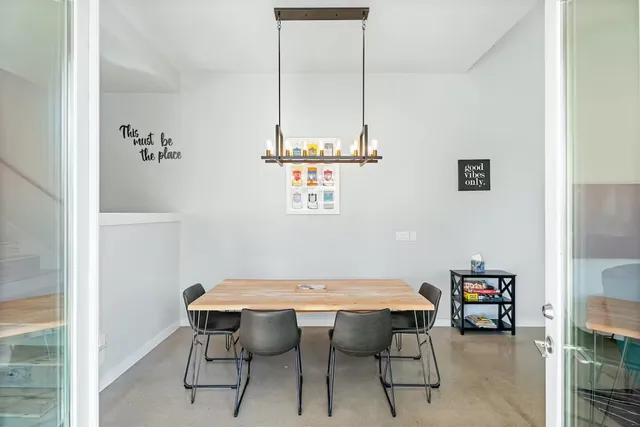 a view of a workspace with furniture
