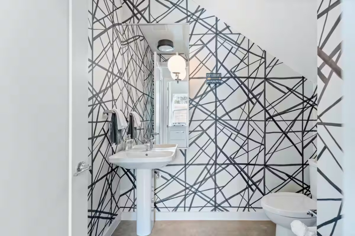 4314 Jinx Avenue, Unit A Austin, TX 78745 - Photo 23 of 40 a bathroom with a sink and a mirror