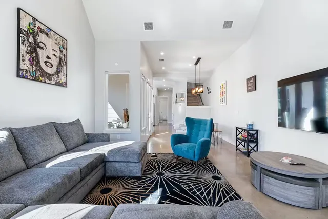 a living room with furniture and a couch