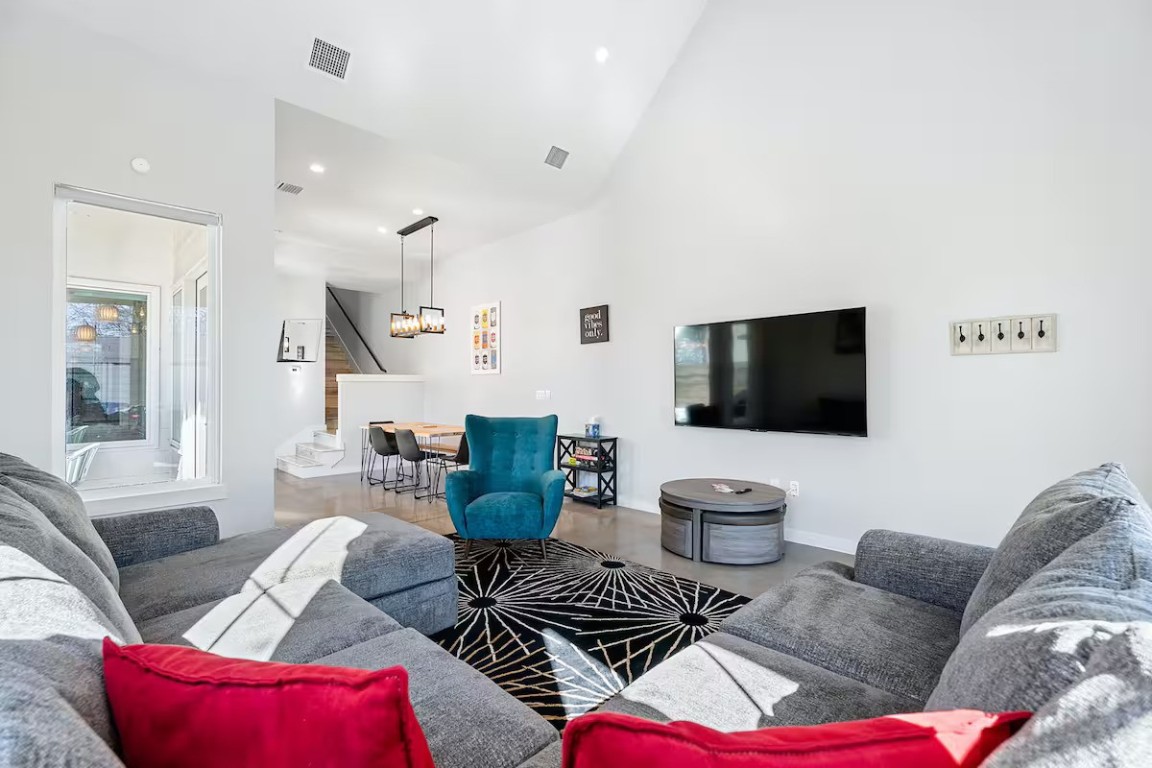 4314 Jinx Avenue, Unit A Austin, TX 78745 - Photo 10 of 40 a living room with furniture and a flat screen tv